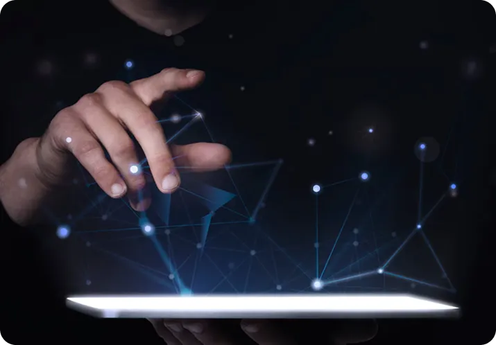 Hands interacting with a glowing digital network on a tablet, representing advanced technological integration and data-driven solutions at Square Corporation.